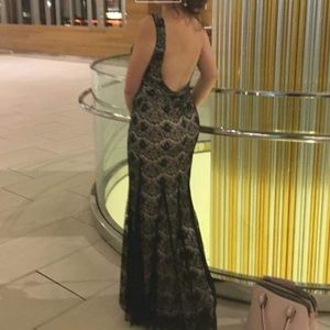 black and nude lace formal gown with open back